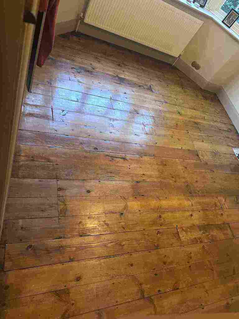 Insulated, repaired, sanded, stained period floorboards